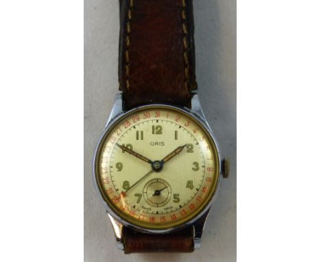 Oris - a stainless steel gentleman's manual wind date pointer wristwatch, circa 1950's, cal. 453, the silvered dial with a su