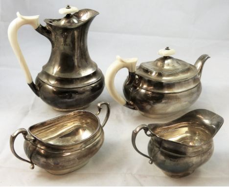 A silver and ivory four piece tea and coffee service, by Viners, Sheffield 1940/41, of oval baluster form, comprising, tea po