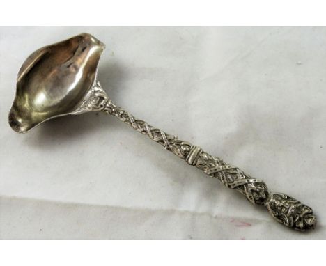 A Victorian silver sauce ladle by Georg Roth & Co. Hanau, imported by Samuel Boyce Landeck, Sheffield 1901, with an ornate ca