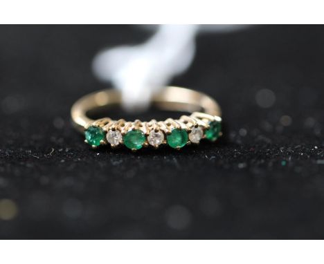 Ladies 9ct Gold Emerald and White Stone set ring Size K. 1.7g total weight 