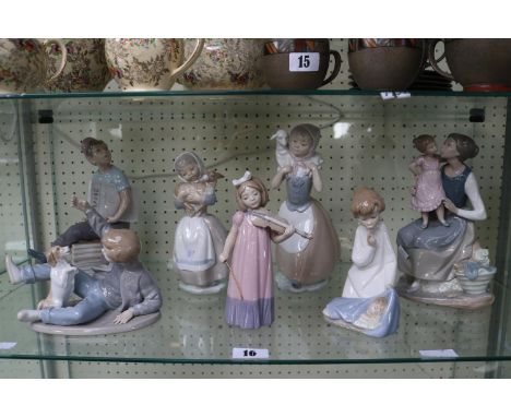 Collection of Seven Nao figures inc. Newspaper Boy, Girl with Violin etc 