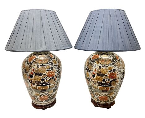 Pair of large and impressive 20th century Japanese Imari table lamps, each of ovoid form, decorated in the Imari palette with