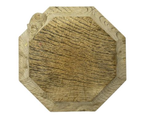 Mouseman - figured oak chopping board or kettle stand, octagonal form with moulded edge carved with mouse signature, by the w