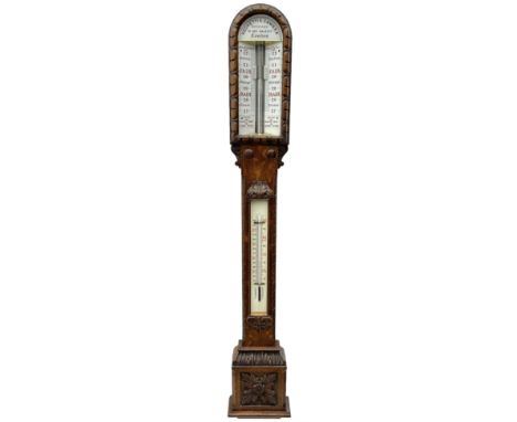 Negretti &amp; Zambra of London - c1860 Victorian carved oak cistern tube storm barometer, with arch top glazed front ceramic