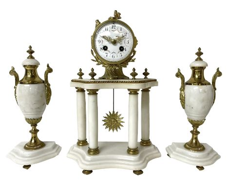 French white marble and gilt-metal striking portico mantel clock and garniture, circa 1910, with four free-standing columns a