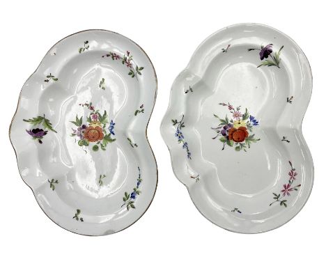 Pair of early 19th century Chamberlain's Worcester dessert dishes, each of kidney shaped form, hand painted with floral spray