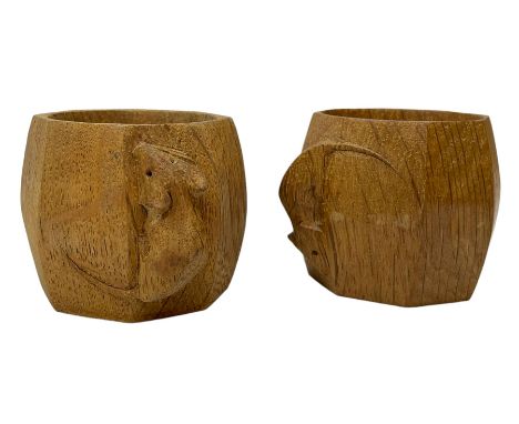 Mouseman - pair oak napkin rings, faceted bulbous form carved with mouse signature, by the workshop of Robert Thompson, Kilbu