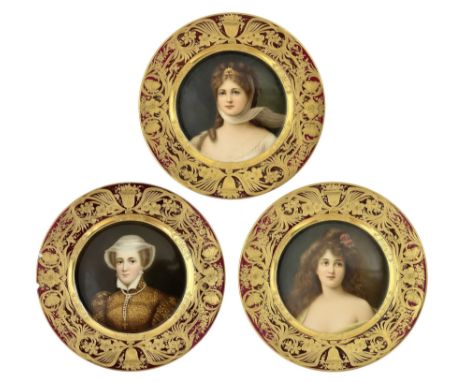 Set of three late 19th century Vienna cabinet plates, each finely painted with a quarter length portrait depicting a female b