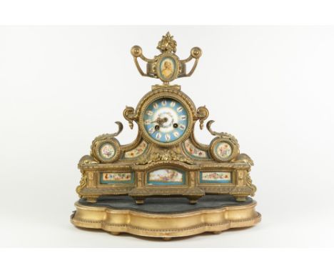 LATE NINETEENTH CENTURY FRENCH GILT METAL AND HAND PAINTED PORCELAIN MOUNTED MANTLE CLOCK, the 3 ½" enamelled Roman dial, pow