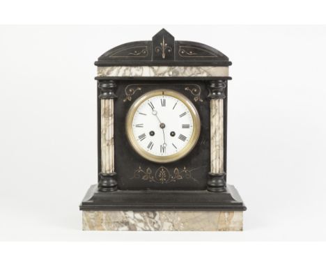 LATE VICTORIAN BLACK SLATE MANTLE CLOCK WITH GREY VEINED MARBLE TRIM, the 4 ¼" enamelled Roman dial powered by a drum shaped 