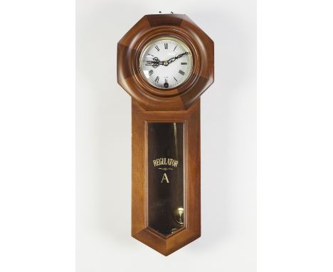 SMITHS OAK MANTLE CLOCK, in Napoleon's hat variant case, the spring driven movement with Westminster chime, 9" (22.9cm) high,