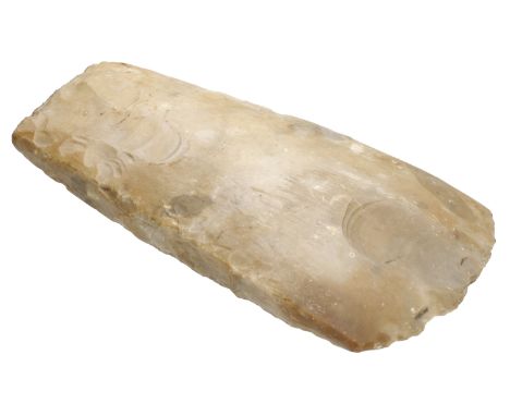 Egyptian, a Neolithic polished flint Hand Axe, c. 4,000 BC, 15cm long by 7.5cm wide, curved cutting edge, Danish in colour an