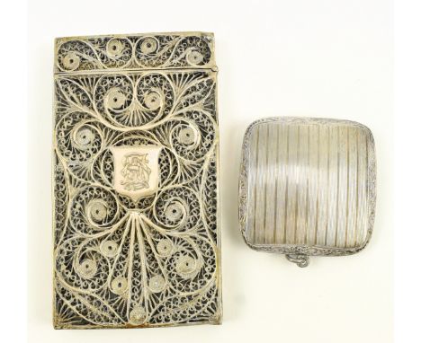 A 20th century hallmarked silver powder compact. Engine turned decoration. Stamped 925 silver mark. Together with a filigree 
