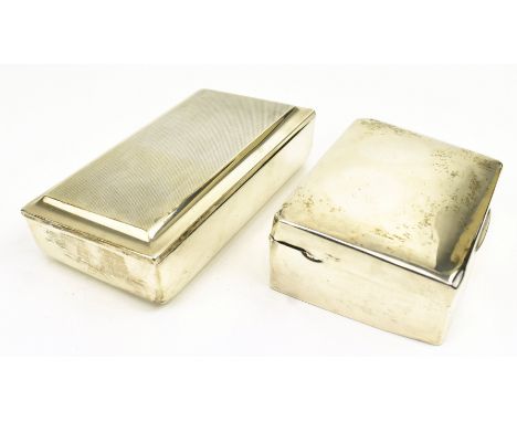 Two 20th century hallmarked silver wood lined cigarette boxes. The lot to include a rectangular wood-lined silver box. Hallma
