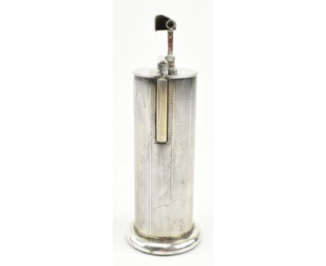 A 20th century silver-plated Parker roller Beacon table lighter. The light being decorated with engine turned case raised on 