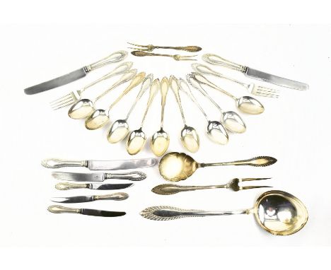 A collection of 20th century 830 marked silver flatware. The lot to include knives, forks, spoons, table spoon, ladle, toasti