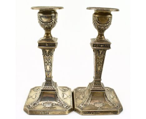 Pair of Edwardian hallmarked silver candlesticks. Hallmarked year 1900, Sheffield. Sponsors mark for Walter Latham &amp; Son.