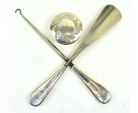 Three Edward VII hallmarked silver pieces. The lot to include a hallmarked silver button case. Hallmarked year 1905, Birmingh