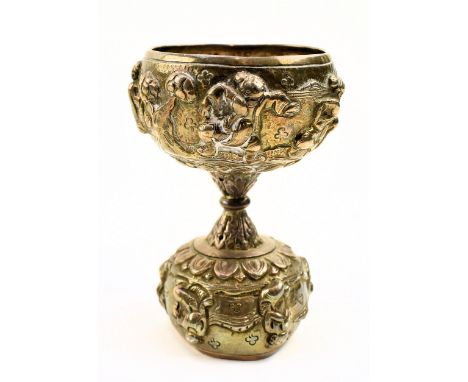 An early 20th century Burmese unmarked silver double spirit measure / jigger. Two bowls form with a central bulbous stem, dec