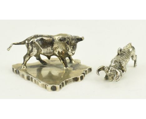 Two 20th century Spanish / European silver figurines of a bull. The lot to include a Spanish silver figurine of a bull. Stamp