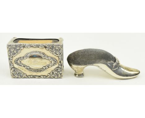 A Victorian hallmarked silver match holder. Hallmarked year 1898, Birmingham. Sponsors mark rubbed. Together with a Victorian