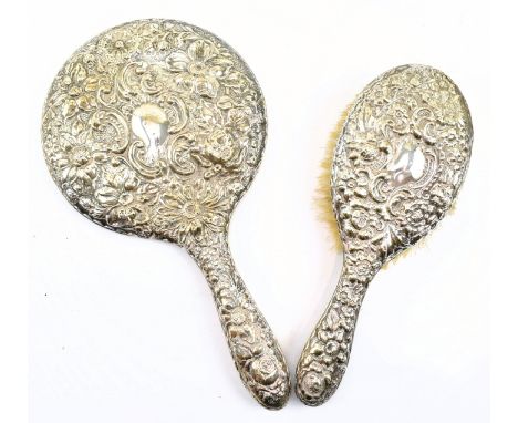 A George V hallmarked silver mounted dressing mirror and brush set. Hallmarked year 1924 Birmingham. Sponsors mark for Daniel