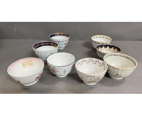 A selection of eight porcelain 18th century tea bowls, Worcester, New Hall and Caughley