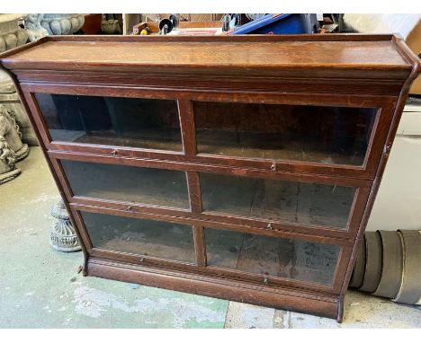 A Globe Wernicke style barrister bookcase, three stacking (H112cm W128cm D30cm)