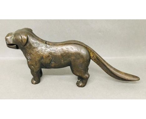 A Cast iron nutcracker in the form of a dog.