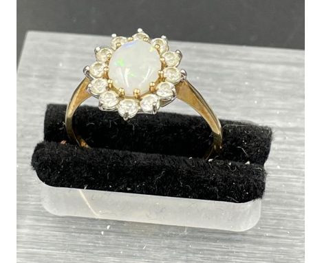 An Opal and diamond 9ct gold ring,N1/2 (1.8g)