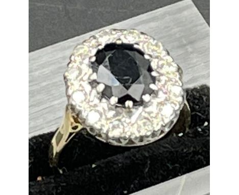 A 14ct sapphire and diamond ring, size N1/2