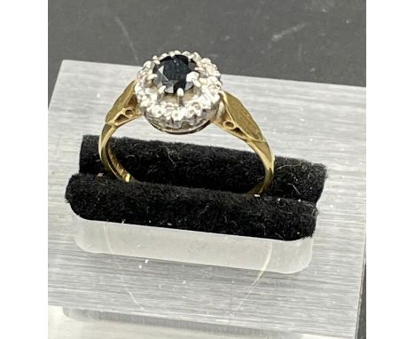 An 18ct gold sapphire and diamond ring, size Q, total weight 3.5g.