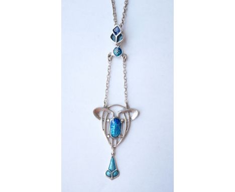 ART NOUVEAU STYLE ENAMEL DECORATED SILVER PENDANT
the drop pendant with blue enamel panels and pierced central section, with 