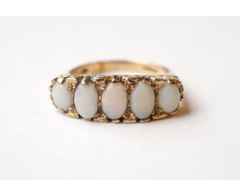 GRADUATED OPAL FIVE STONE RING
on nine carat gold shank, ring size N-O
