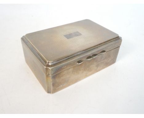 GEORGE V SILVER CIGARETTE BOX
with engine turned decoration, engraved 'Edward, Glasgow' to base rim, Sheffield 1930, 5cm high