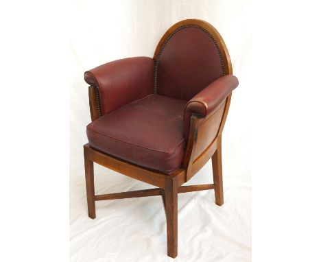 1950's MAHOGANY OFFICE ARMCHAIR
the shaped back with stud work detail above a removable seat cushion covered in rexine, stand