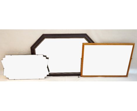 LIGHT OAK WALL MIRROR
with a cushion frame and bevelled plate, 55.5cm x 77cm, a mahogany framed shaped wall mirror, 98.5cm x 