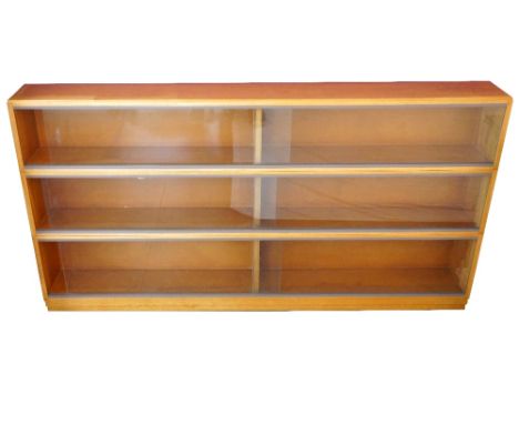 RETRO 'SIMPLEX' LIGHT MAHOGANY SECTIONAL BOOKCASE
in three sections, with glazed sliding doors, 95.5cm high x 183cm wide
