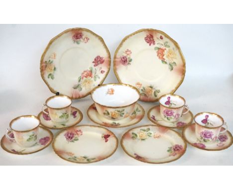 ADDERLEY'S TEA SERVICE
decorated with roses with a gilt border, comprising twelve tea cups, twelve saucers, tea bowl, two san