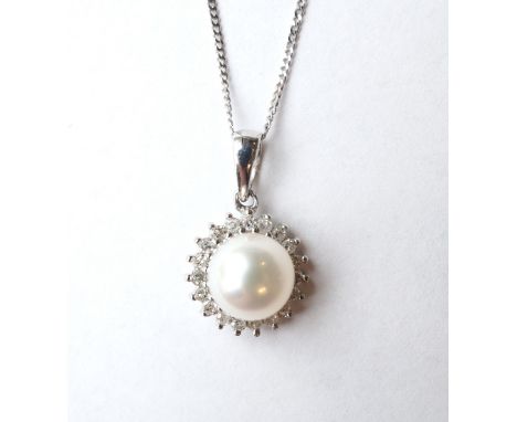 PEARL AND DIAMOND CLUSTER PENDANT
the central pearl in diamond surround totalling approximately 0.14cts, in nine carat white 