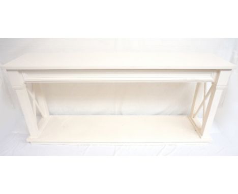 LARGE PAINTED BEECH CONSOLE TABLE
with an oblong top above a panelled frieze, standing on square block supports with cross st