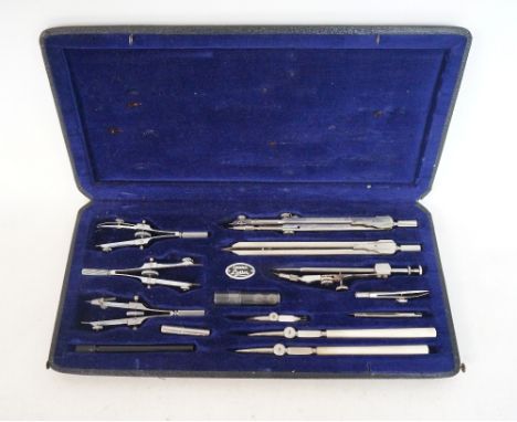 LOTHER OF GERMANY CASED COMPASS SET
comprising six stainless steel compasses and technical attachments 