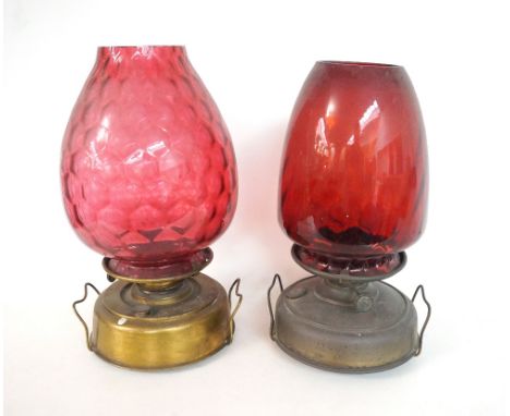 TWO HEATER LAMPS
both with circular metal reservoirs with carrying handles, one marked Sherwoods Sun to the handle and Britis