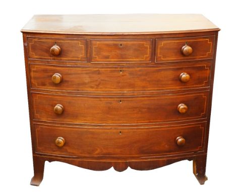 VICTORIAN BOW FRONT MAHOGANY CHEST
with three short and three long graduated cockbeaded drawers with turned handles, standing