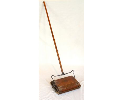 EWBANK CARPET SWEEPER
with a turned wooden handle above a wood and metal body labelled 'Federation No1' 
