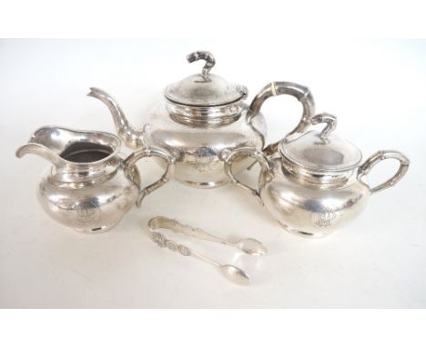 CHINESE EXPORT SILVER TEA SERVICE
early 20th century, comprising teapot; sugar basin with cover and milk jug, with bamboo sty