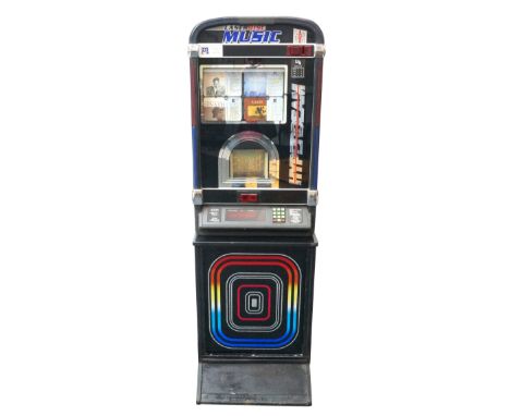 PERFORMER WALL 2000 JUKE BOX
with approximately 100 CD'S, coin operated with remote controller with free play function, with 