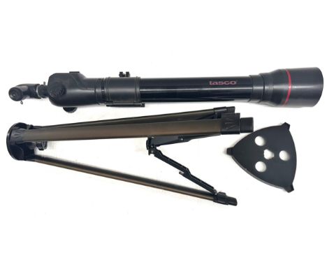 A Tasco telescope and stand 
