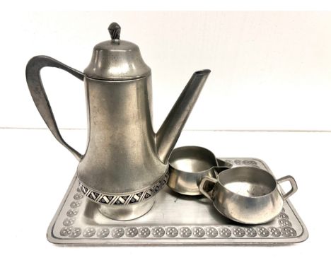 A Norway Hagness pewter three piece coffee service with tray 