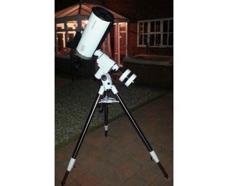 A Vixen VC200L F9 catadioptric telescope having VISAC Aspherical Mirror Reflector. With Skywatcher HEQ5 Pro GOTO tripod mount